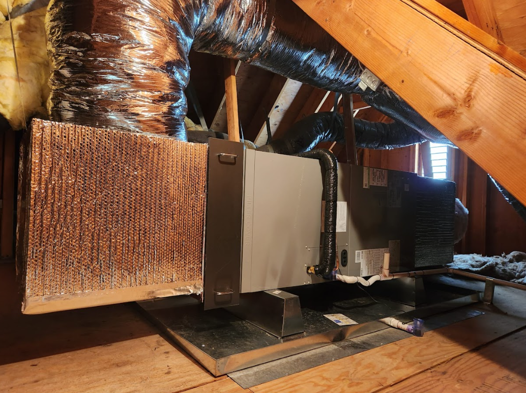 inside hvac unit in attic