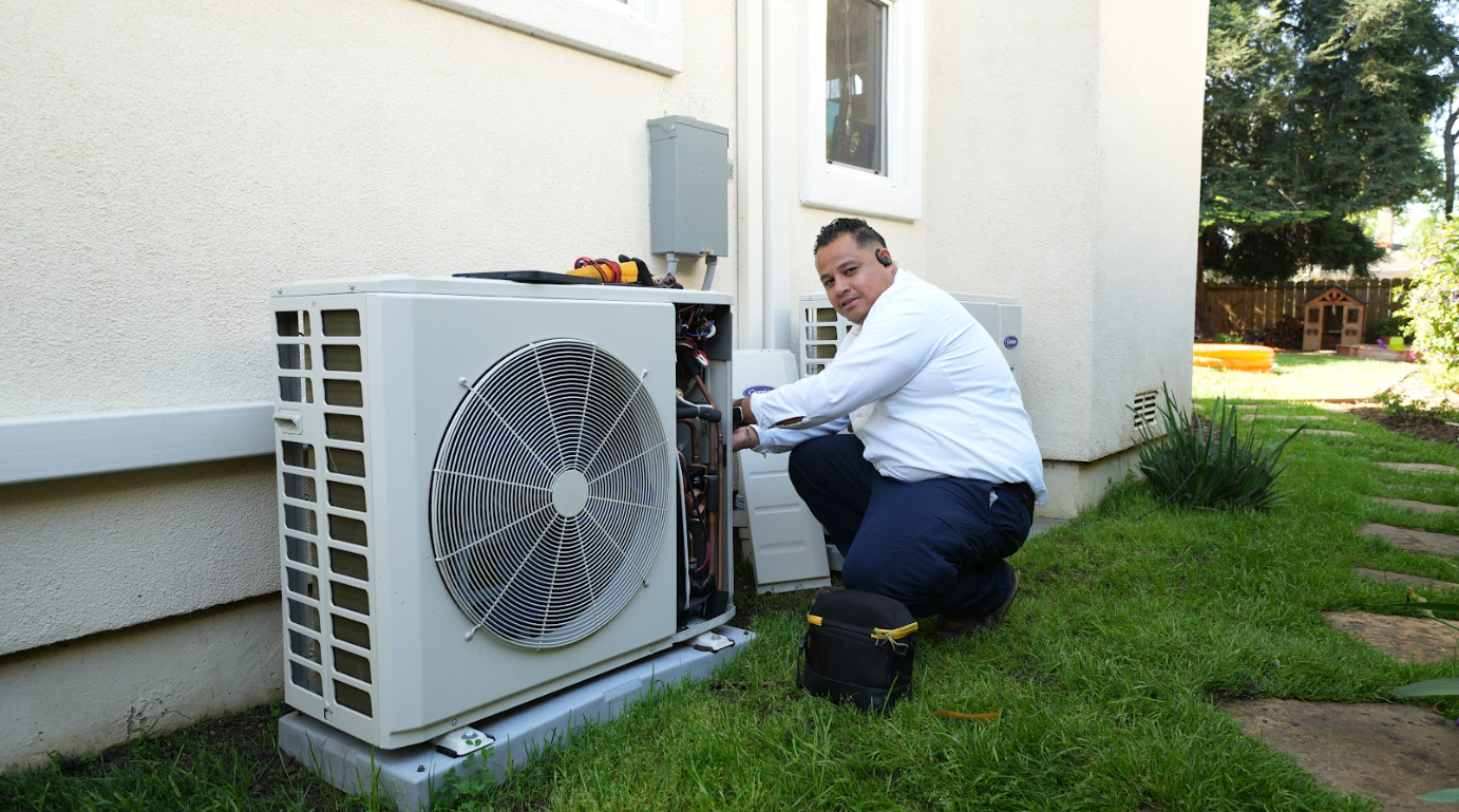 employee with outside ac unit
